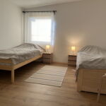 Apartament 4-osobowy z klimatyzacją z dostępem do ogrodu z 2 pomieszczeniami sypialnianymi (możliwa dostawka)