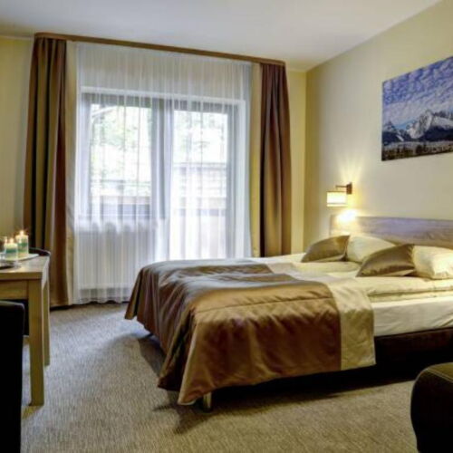 Komfort Pokoj s balkónem s manželskou postelí