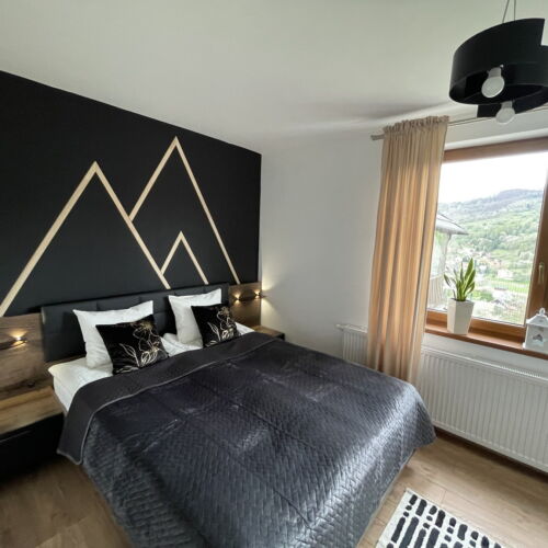 Apartament cu terasă cu vedere spre munte cu 2 camere pentru 5 pers.