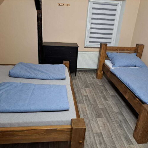 Pokoj se společnou kuchyňkou  pro 3 os.