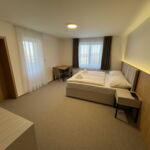DELUXE s balkónem Double bed / Twin bed 202