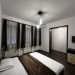 Apartament 8-osobowy na piętrze Economy z 3 pomieszczeniami sypialnianymi