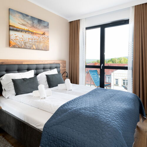 Apartament 6-osobowy z balkonem z prysznicem z 3 pomieszczeniami sypialnianymi