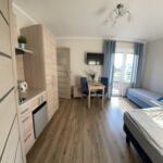 Balcony Triple Room with Kitchenette
