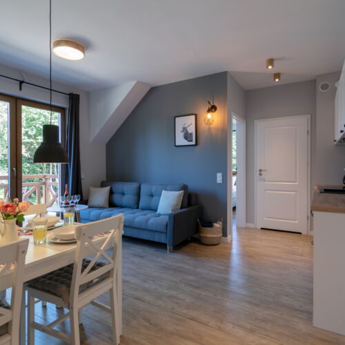 Apartament 4-osobowy z balkonem z dostępem do ogrodu