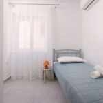 Upstairs 3-Room Air Conditioned Apartment for 4 Persons