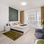 Design Apartman s balkónem s manželskou postelí s 1 ložnicí