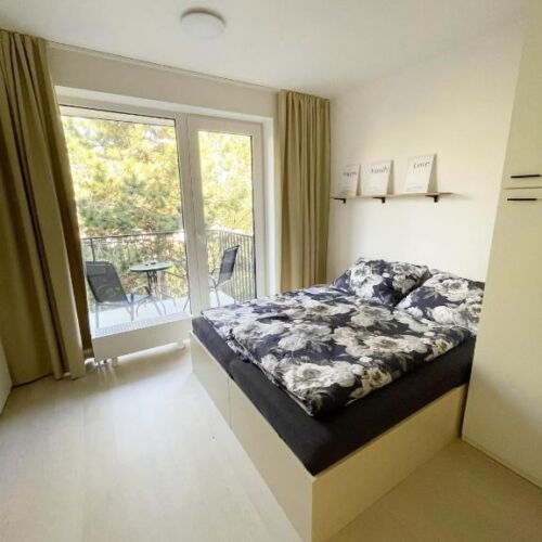 Apartman se sprchou s vlastní kuchyňkou s manželskou postelí s 1 ložnicí