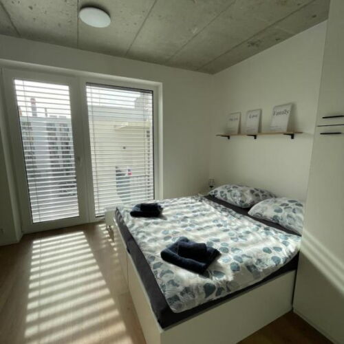 Apartman se sprchou s vlastní kuchyňkou s manželskou postelí s 1 ložnicí