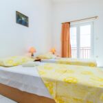 Apartman s klimatizací s balkónem pro 4 os. se 2 ložnicemi A-22646-b