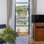 2-Zimmer-Suite für 4 Personen mit Balkon und Aussicht auf das Meer