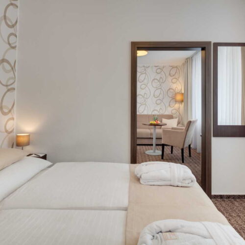 Junior  Pokoj s manželskou postelí (s možností přistýlky)