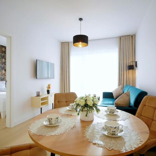 Apartament 4-osobowy z balkonem z 1 pomieszczeniem sypialnianym