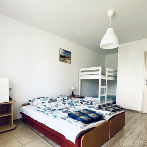 Pokój 4-osobowy z prysznicem z dostępem do ogrodu