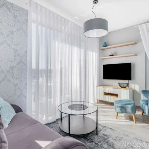 Apartament 4-osobowy z balkonem z aneksem kuchennym z 2 pomieszczeniami sypialnianymi