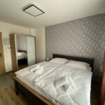 Apartament 4-osobowy Komfort Przyjazny podróżom rodzinnym z 2 pomieszczeniami sypialnianymi