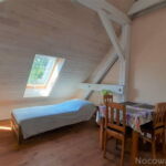 Dreibettzimmer mit Eigner Küche