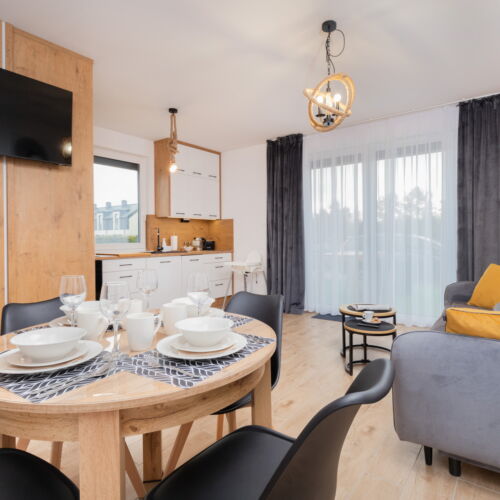 Apartament 6-osobowy z tarasem cały dom z 3 pomieszczeniami sypialnianymi