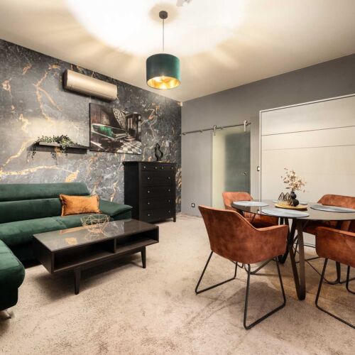 Apartament la parter cu duș cu 1 camera pentru 3 pers. (se poate solicita pat suplimentar)