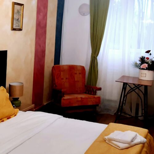 Apartament la parter cu vedere spre grădină cu 3 camere pentru 5 pers.