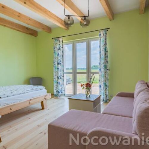 Balkonos kerthelyiséggel négyágyas szoba