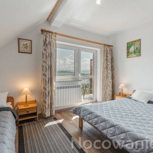 Dreibettzimmer Obergeschoss mit Panorama auf den See