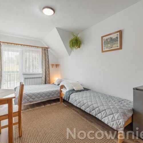 Dreibettzimmer Obergeschoss mit Aussicht auf die Stadt