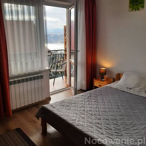 Doppelzimmer Obergeschoss mit Panorama auf den See