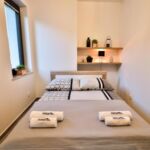 Apartament 4-osobowy z balkonem z 2 pomieszczeniami sypialnianymi