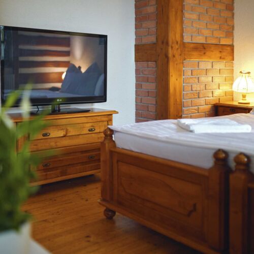 Dvoulůžkový pokoj s manželskou postelí