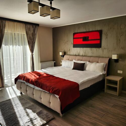 Apartament la parter cu vedere spre grădină cu 2 camere pentru 6 pers.