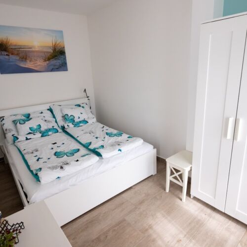 Apartament la etaj cu vedere spre grădină cu 2 camere pentru 4 pers.