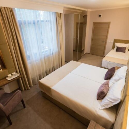 Camera tripla premium