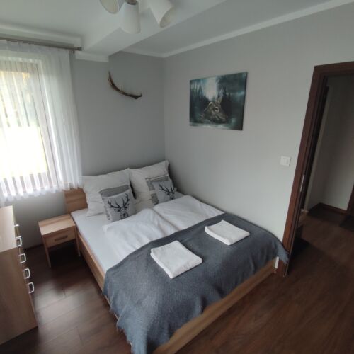 Apartament 4-osobowy z 2 pomieszczeniami sypialnianymi (możliwa dostawka)