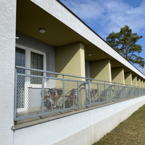 Pokoj s balkónem se sprchou s manželskou postelí (s možností přistýlky)