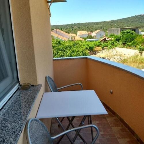 Upstairs 1-Room Air Conditioned Apartment for 3 Persons