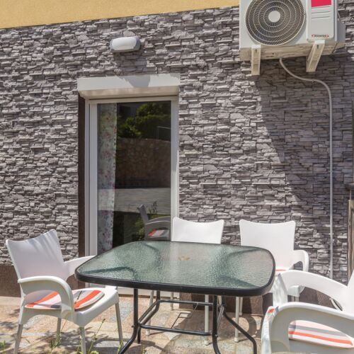 Apartament 3-osobowy z klimatyzacją z tarasem z 1 pomieszczeniem sypialnianym AS-23575-a