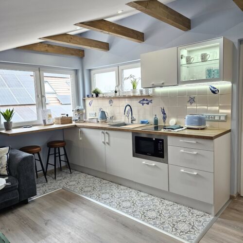 Apartament 4-osobowy na piętrze z 2 pomieszczeniami sypialnianymi (możliwa dostawka)