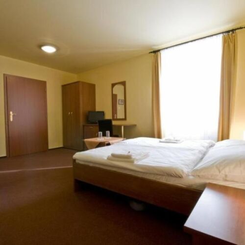 Apartman s vlastní kuchyňkou s privátní koupelnou mimo apartmán pro 4 os. (s možností přistýlky)