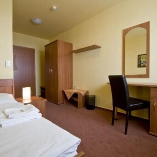 Apartman s vlastní kuchyňkou s privátní koupelnou mimo apartmán pro 4 os. (s možností přistýlky)