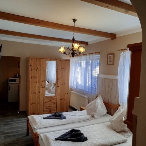 Pokoj pro 2 os. s výhledem do zahrady 