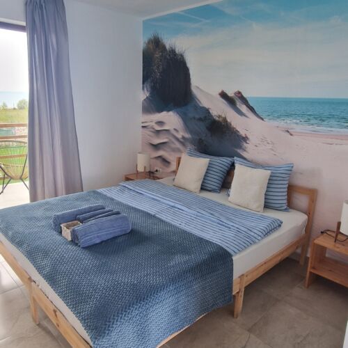 Camera dubla la parter cu vedere spre mare