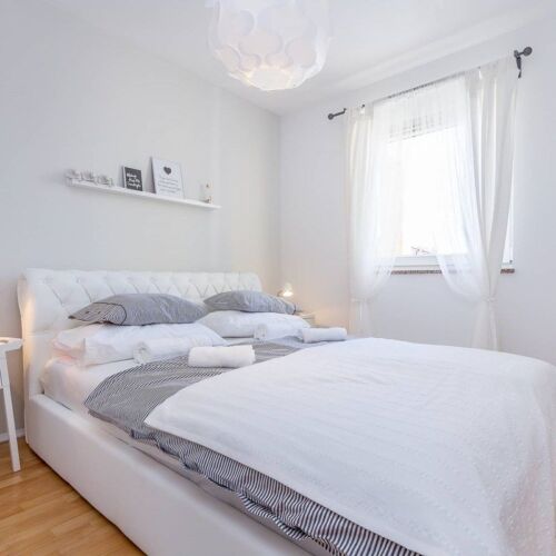 Apartament 4-osobowy z klimatyzacją na piętrze z 2 pomieszczeniami sypialnianymi