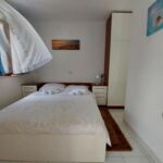 Apartament 4-osobowy na piętrze z widokiem na morze z 2 pomieszczeniami sypialnianymi