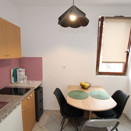 Apartament 4-osobowy na parterze z tarasem z 2 pomieszczeniami sypialnianymi