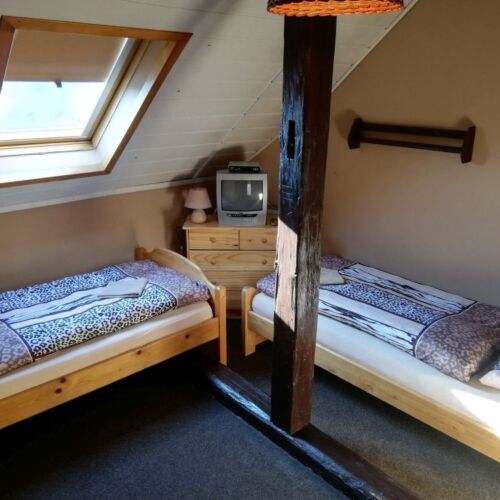 Camera twin la mansardă