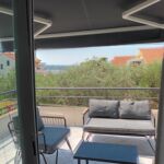 Apartament 4-osobowy z klimatyzacją z widokiem na morze z 1 pomieszczeniem sypialnianym A-23643-b