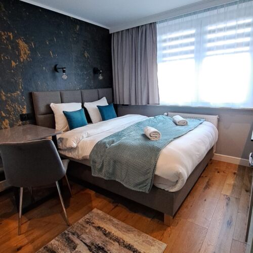 Pokoj s manželskou postelí