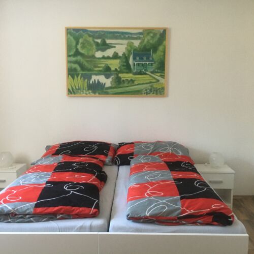 Pokoj s manželskou postelí s výhledem na město přízemní (s možností přistýlky)