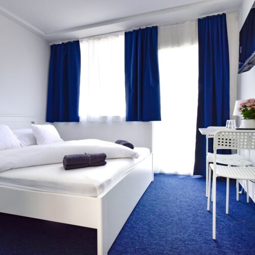 Familie Vierbettzimmer mit Verbindungstür